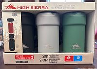 Box containing three High Sierra 2-in-1 Can Cooler Tumblers in black, light gray, and green colors with branding visible on each and packaging details.