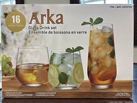 Box front showing 16-piece Arka glass drink set with images of three different types of glasses filled with beverages.