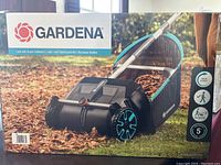 Boxed Gardena leaf and grass collector showing product image and branding.
