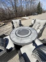 Patio set on driveway showing table and chairs setup from overhead angle