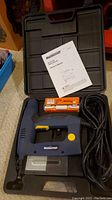 Mastercraft electric brad nailer in carrying case with owner's manual and Paslode brad nails box