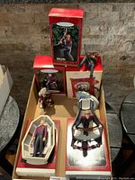 Five Hallmark boxed Star Trek Keepsake ornaments displayed in a box.