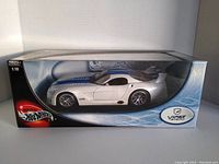 Front angled view of the boxed Hot Wheels Dodge Viper GTS-R 1:18 scale model in original sealed packaging.