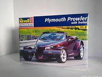 Front view of the sealed Plymouth Prowler model car kit box featuring the car on the street.
