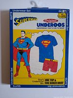 Front of original yellow and blue box showing Superman illustration and actual product image (shirt and boxer brief) size XL