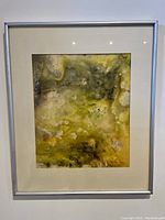 Framed original abstract watercolour painting by Urve Aedna with shades of yellow, green, and brown, signed in lower right.