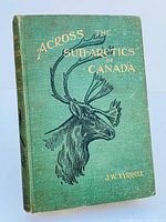 Front cover showing green cloth with embossed gold and black text and moose illustration.