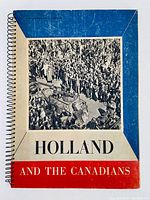 Front cover of the spiral-bound photographic book titled 'Holland and the Canadians' showing a historic black and white photo with military vehicles and a crowd.