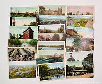 Photo of a group of antique postcards featuring various views and landmarks of Hamilton, Ontario, Canada including city buildings, railway scenes, nature, and market scenes.