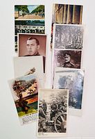Top view of 11 antique military postcards including WW1 soldier portraits, military scenes in color and black and white.