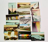 Image showing an assortment of 17 postcards depicting Niagara Falls and nearby landmarks, including illuminated falls, boats, bridges, and monuments.