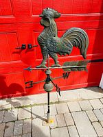 Front view of entire weathervane assembly showing rooster, arrow and directionals