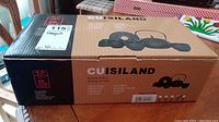 Photo of original box showing brand Cuisiland, lot price tag, and set illustration.