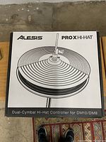 Image of the Alesis Pro X Hi-Hat box showing the product branding and illustration of the hi-hat controller on the front.
