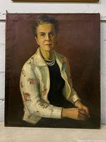 Full view of the signed oil on canvas portrait painting of a seated woman