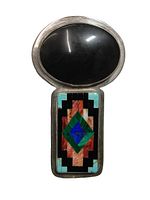 Front view of the Native American sterling silver pendant with large oval black onyx stone and colorful mosaic stone inlay below.