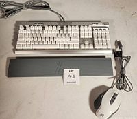 Full shot of Corsair K70 RGB MK.2 SE keyboard with detachable wrist rest and Corsair M65 RGB Elite white gaming mouse with cables
