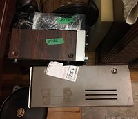 Three vintage audio units stacked: Onkyo with wooden sides, Bisonic System 14 metal case, Sansui 250 metal case on bottom.