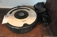 iRobot Roomba model 620 robot vacuum cleaner with docking station.