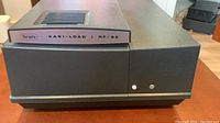 Side view showing the model label Sears EABI-LOAD RF-53 on the slide projector.