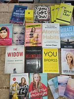 Books and affirmation cards arranged for viewing to show titles and authors