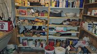 Shelf with various paint cans excluded from lot, boxes, and miscellaneous tools