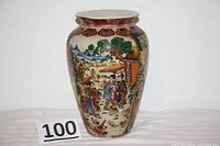 Full front view of the Satsuma vase showing entire body with figures, pavilion, and landscape.