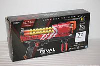 Front angle photo of the original box showing the red Nerf Rival Artemis XVII-3000 and its packaging with branding and specifications.