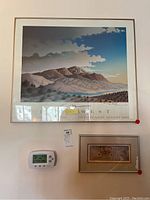 Large framed print of mountain landscape with sky, 25x29 approximate size