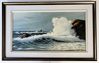 Framed oil painting showing the full artwork including frame, depicting a seascape with waves crashing against rocks, signed lower left.