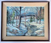 Full view of framed painting showing wood frame, beige mat and winter landscape scene