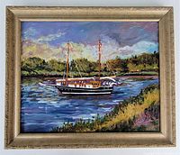 Front view of the framed oil painting showing a sailboat on a river landscape in colorful tones.