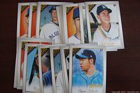 Multiple baseball rookie cards displaying various players including Ryan Borucki and Yu Darvish in classic card design, shown in clean condition.