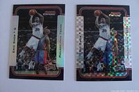 Front view of two Eric Snow NBA basketball cards from 2003 Bowman Chrome, one standard edition and one Refractor edition with holographic effect.