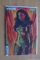 Front cover of the Future State Superman/Wonder Woman #1 comic with WW84 Gal Gadot photo variant showing the armored Wonder Woman in red and gold against a red background.