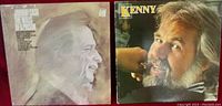Photo of two vinyl records: Johnny Cash's "The Walls of a Prison" and Kenny Rogers' "Kenny" album cover showing front artwork side by side.