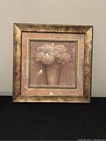 Framed picture with light pink roses in a vase, gold-tone wide frame