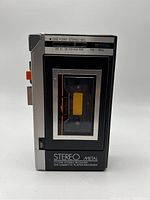 Front view of Citizen JWS-551 showing cassette compartment, stereo label, and one-point stereo microphone indicator.