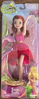 Front view of Disney Fairies Rosetta figure in original sealed packaging showing the figure with pink dress and wings.