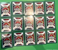 Backs of 15 Pokemon World Championship 2014 cards showing the tournament insignia and design.