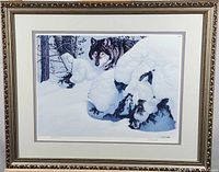 Full front view of framed limited edition print "Winter Wolf" showing the wolf in a snowy winter landscape with mountain pine trees.