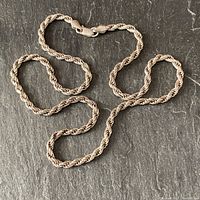 Full 20-inch sterling silver rope chain laid out
