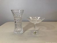 Photo showing the Waterford vase and compote together for scale and overview of the lot.