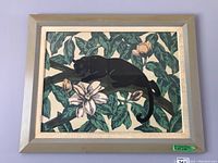 Frontal view of the framed vintage panther print showing the entire artwork and frame