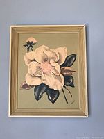Framed floral print showing large white flower with pink center and unopened bud, signed 'Ren'