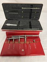 Starrett depth micrometer set including micrometer and steel rod attachments in foam-lined metal case.