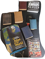 Lot showing eight books of various subjects and styles along with a Paul McCartney stamp collection and a vintage electronic item with cables
