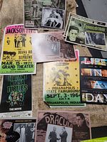 Various posters including concert and movie themes featuring The Jackson 5, Dracula, Frankenstein, The Texas Chainsaw Massacre, and other titles.