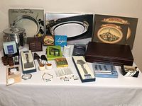 Overview of the vintage entertaining lot showing all items arranged on table