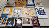 Children's collectible books arranged on a table with a variety of classic titles and colorful illustrated covers.